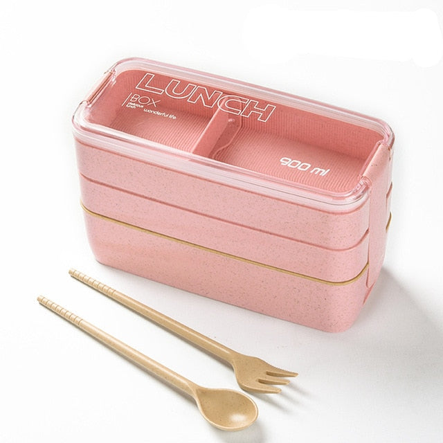 A Three-tiered Compartment Lunch Box With Fork, Spoon, Chopsticks